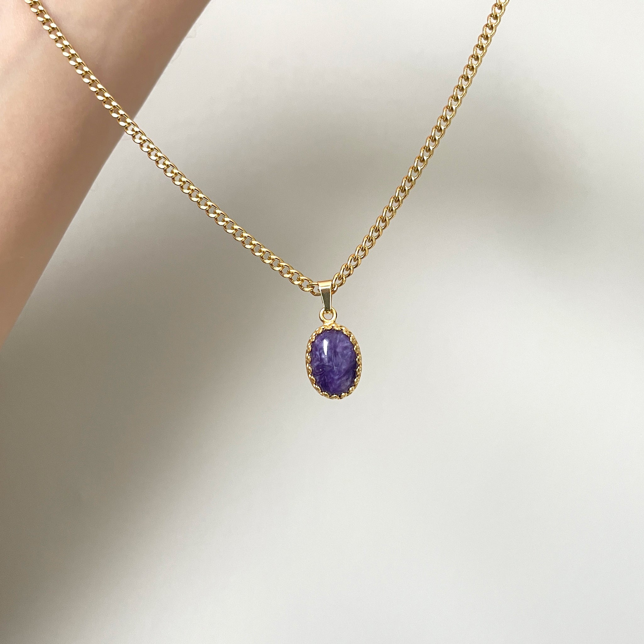 paarse edelsteen ketting goud