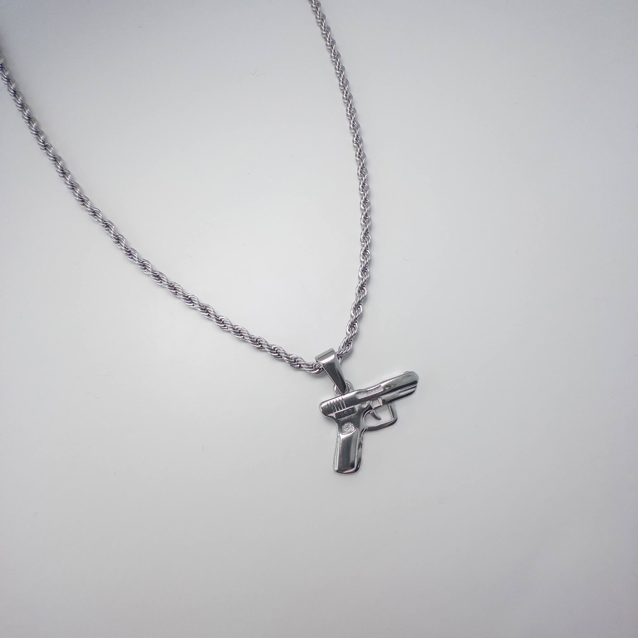 Pistool ketting minimalistisch